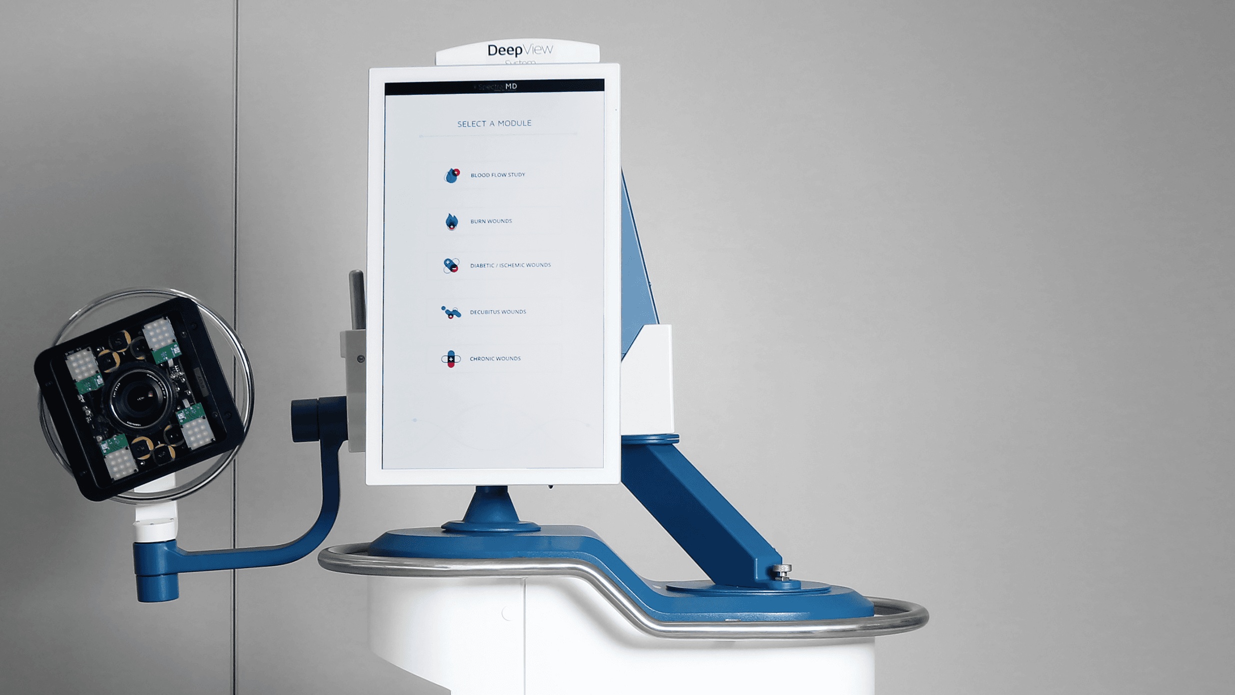 SpectralMD DeepView medical imaging device with vertical touchscreen and imaging head.